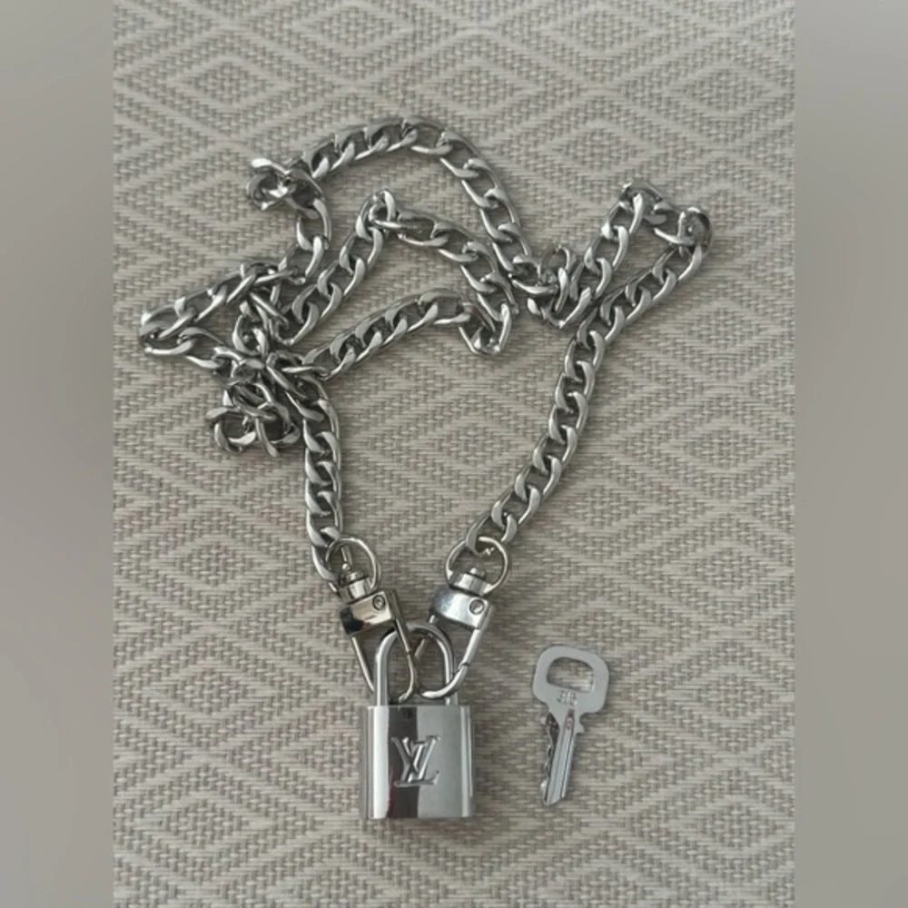 Louis Vuitton Silver Padlock w/ key & 27” Chain   to be worn as necklace